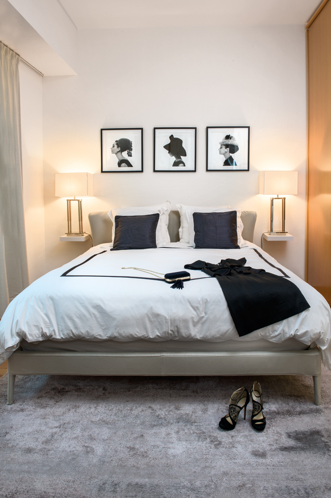 Prints of Cecil Beaton's Audrey Triptych (1964) sit above the Maxalto bed by Febo in the master bedroom.