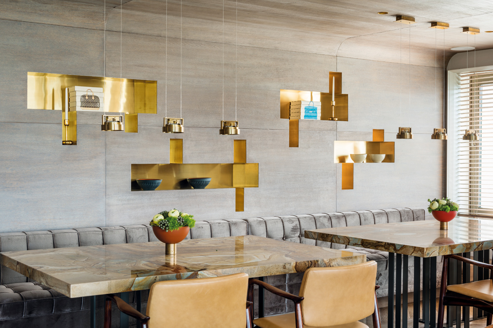 A plethora of pendant lights provide talking points in the dining area.