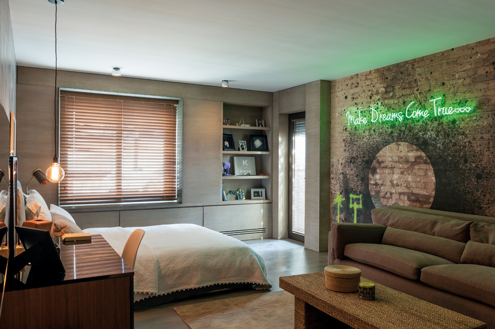 The attention to detail in Sule's home is meticulous, from neon artworks in the bedrooms...