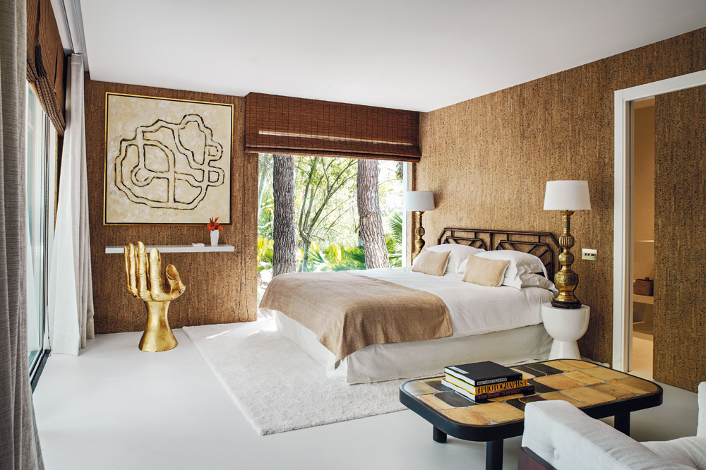 Tarnished-gold accents add a bohemian opulence to the cabana.