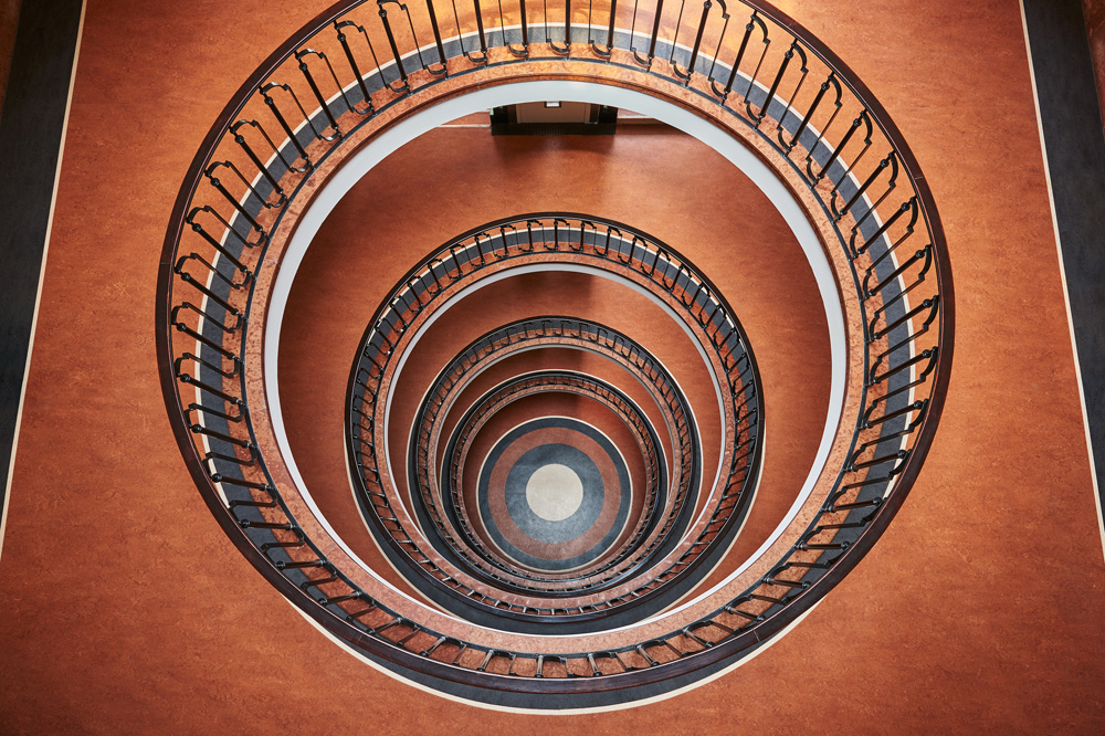 Through the Lens: Balint Alovits Captures Sculptural Staircases in Budapest