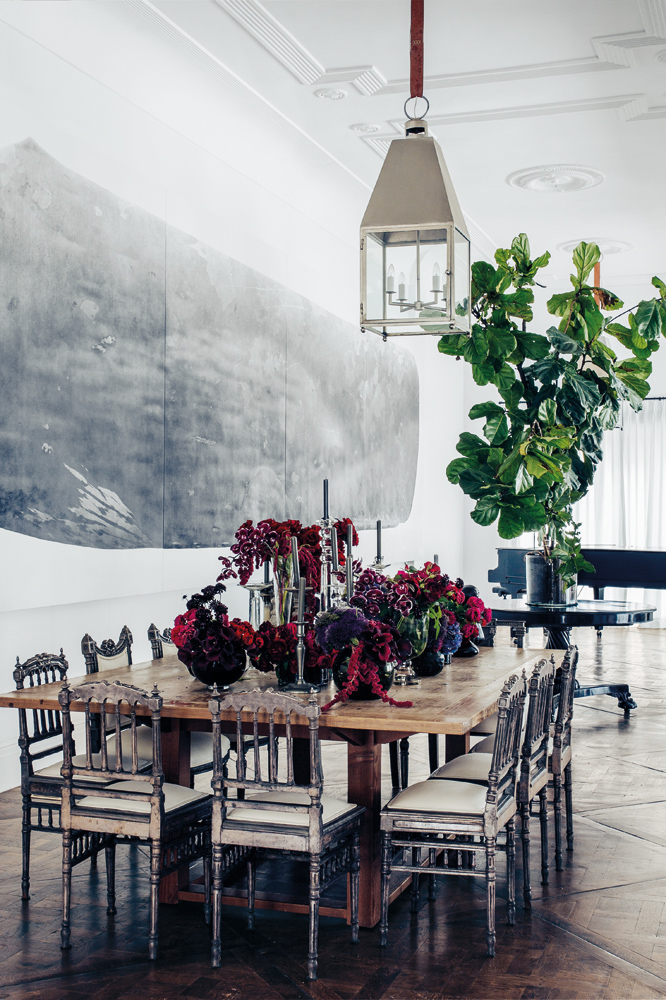 Dining chairs from a maharajah's palace in India surround a Danish oak table Collette has owned for 15 years.