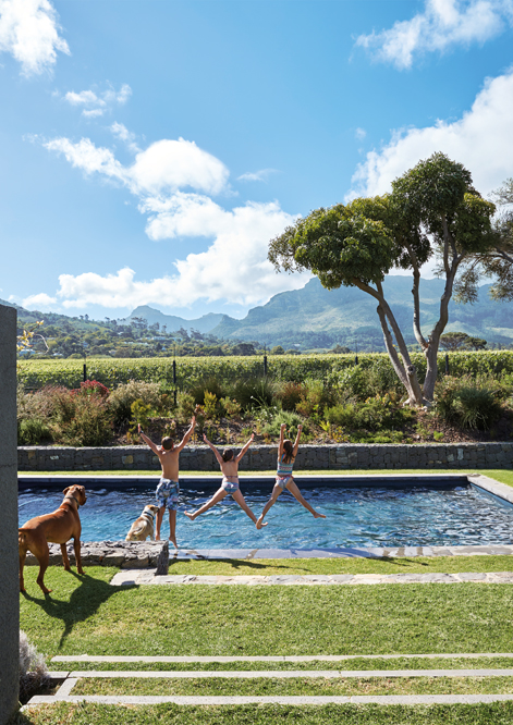 This family home bordering a wine estate is surrounded by spectacular views
