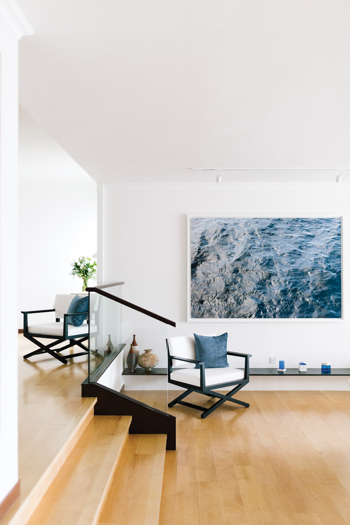 This blue-and-white home by Peggy Bels is the perfect canvas for museum-grade art