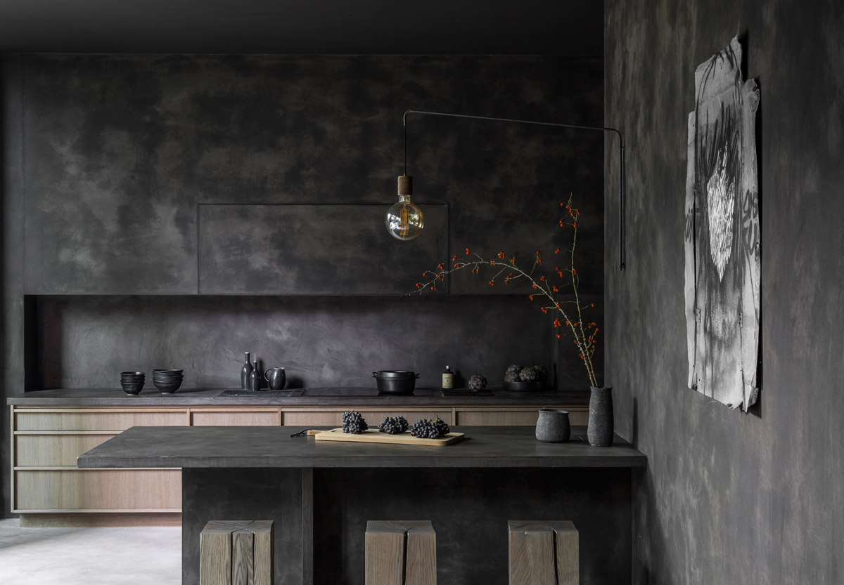 Dark volumes reign in this 7,000sqft clay-coated minimalist home in Brussels