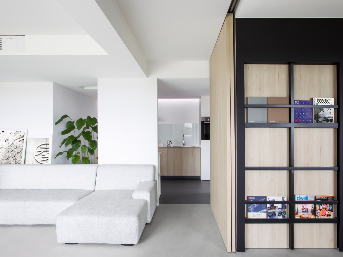 A 1,200sqft HDB flat in Singapore eschews walls for a fluid, uplifting home