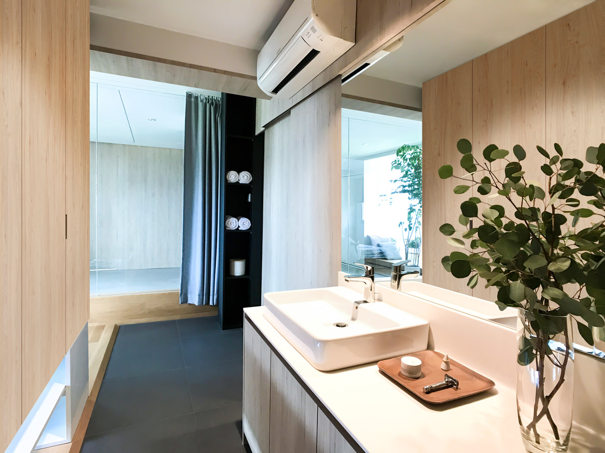 A 1,200sqft HDB flat in Singapore eschews walls for a fluid, uplifting home