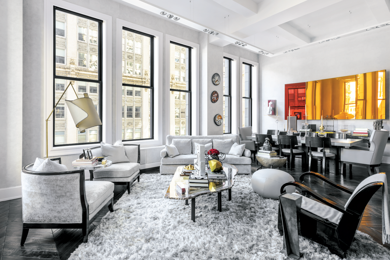 With his collection of sculptures and paintings in mind, Kenneth chose to dress his apartment in varying shades of grey