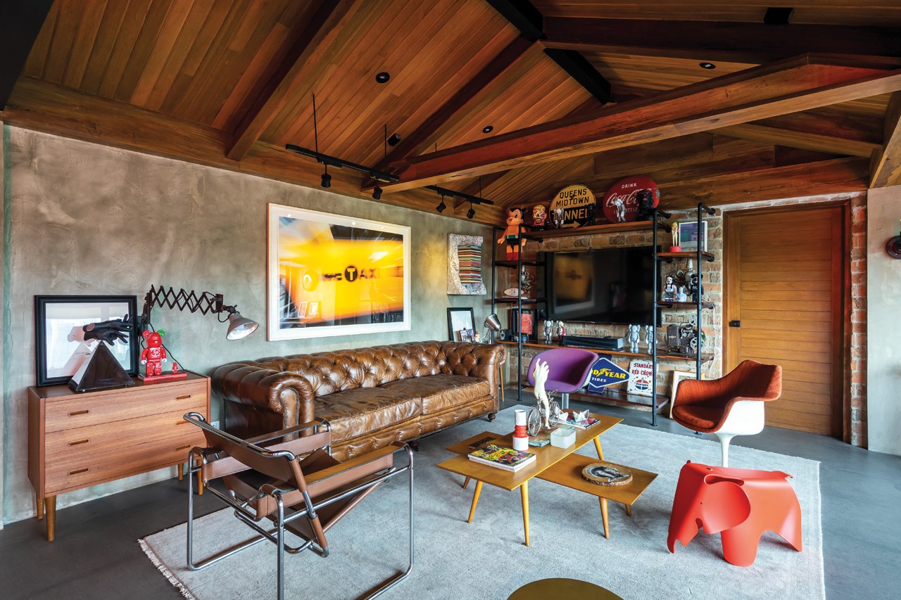 The husband’s man cave is an amalgam of influences inspired by his time living in Boston. “The East Coast had a very unique look, especially bars and restaurants, so that’s the aesthetic I learned to like,” he says.