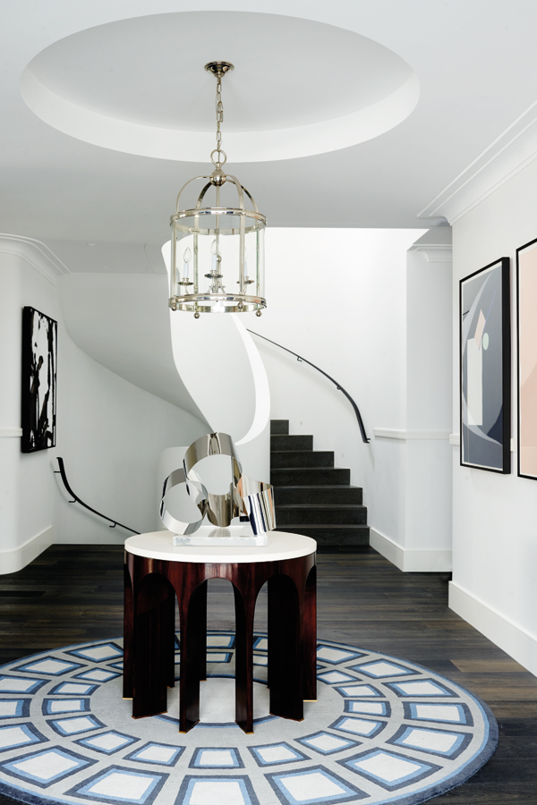The entrance hallway; an art deco-inspired aesthetic flows throughout the home, visually connecting the striking abode to its historic locale and evoking a sense of timeless elegance within.