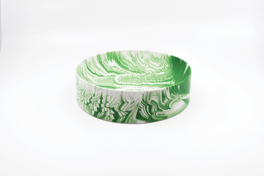 This large poured bowl features a beautiful marble-effect pattern