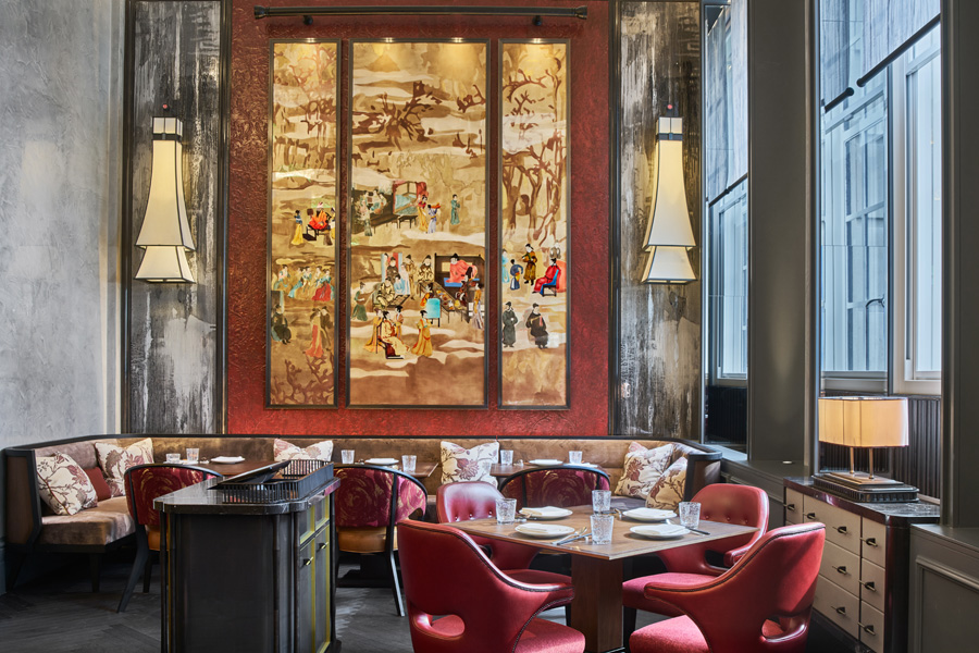 A gold triptych dominates the main dining room, which also features plum blossom patterns, evoking the restaurant’s name