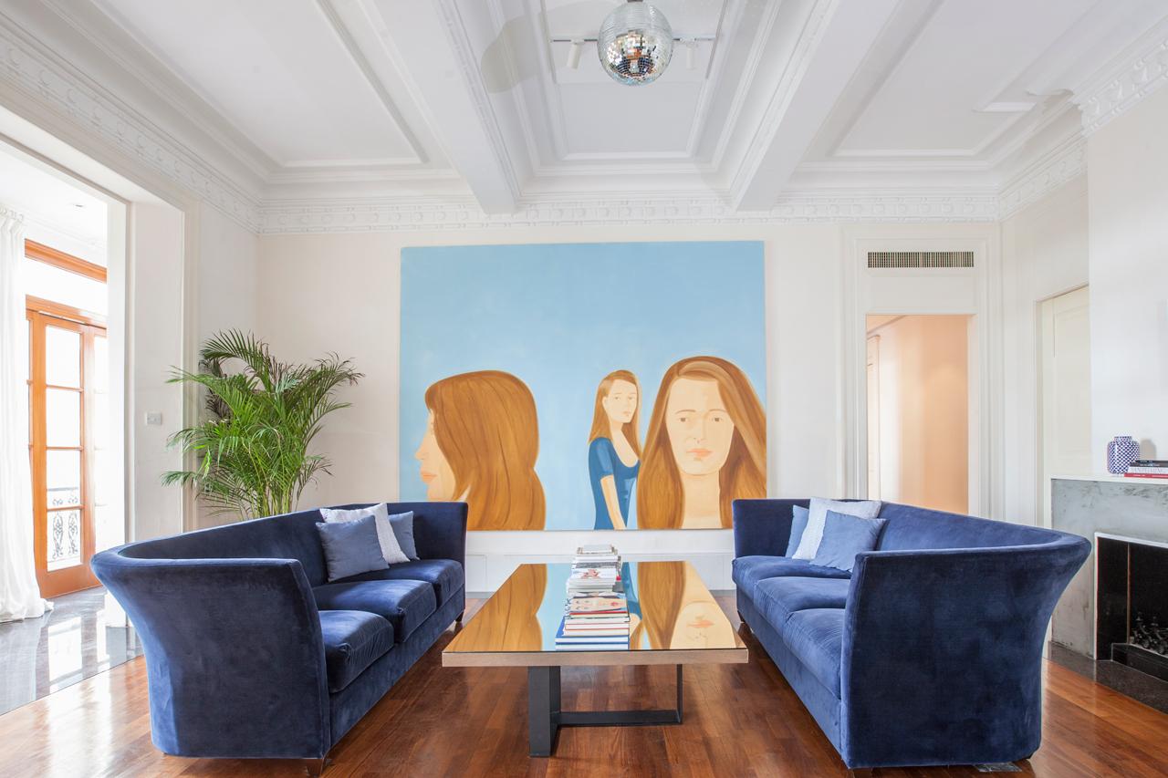 The living room features a large-scale Alex Katz work