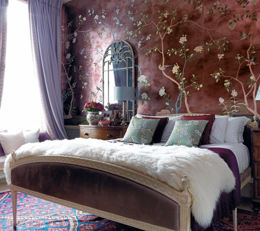 Hannah's favourite wallpaper in the home can be found in her bedroom: titled Badminton, it features a design painted on silver leaf gilded paper that imitates tarnished silver. The antique mirror is from Lots Road Auction House, while the white fur throw is from Wildash.
