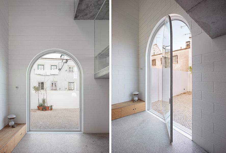 A pivoting arched door provides access to the courtyard. (Photo by Dylan Perrenoud)