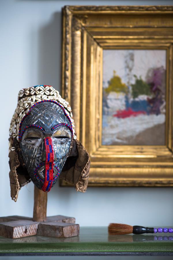 Accessories and sculptures collected from the couple's trips add tribal flavour 