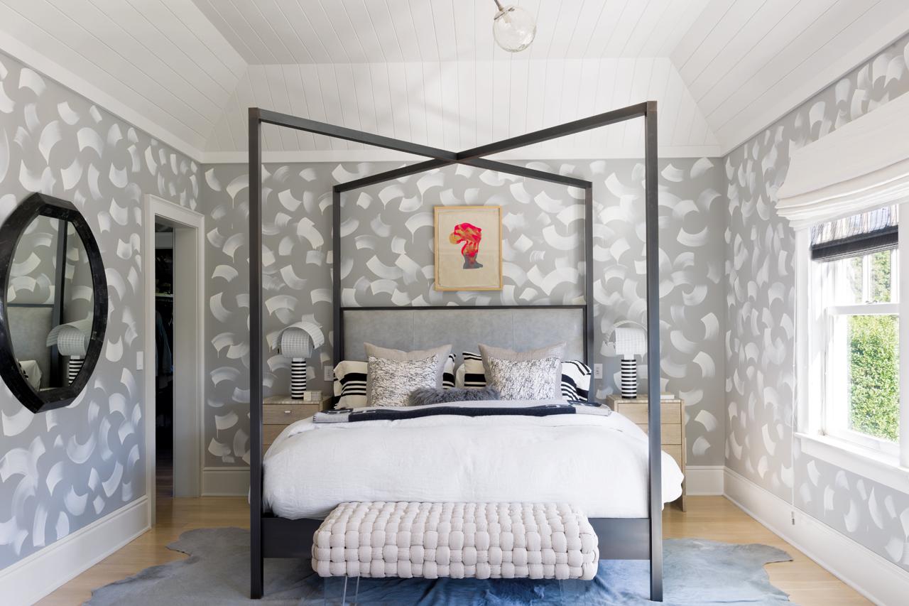 The custom bed is complemented with Maison de Vacances and Kelly Wearstler linens and pillows; the throw is Hermès.