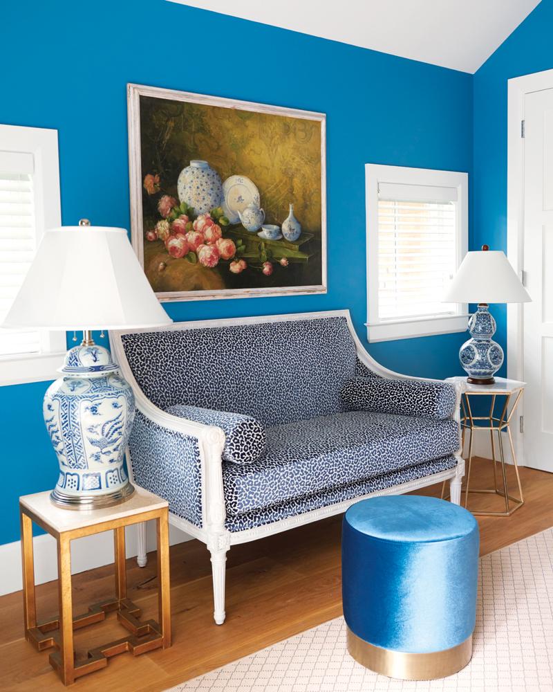 Blue walls and a ping-pong table imbue cheer into the home office