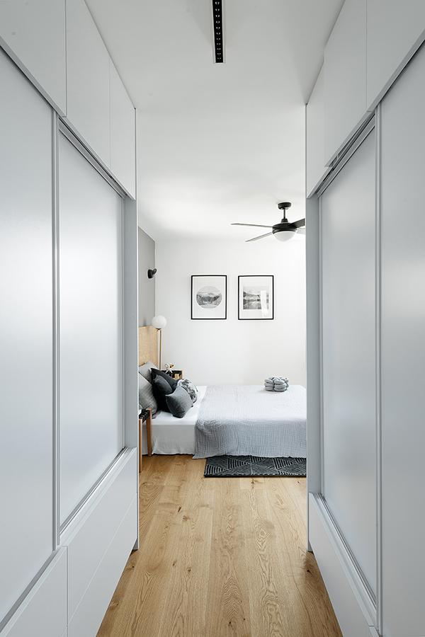 Closets on either side of the corridor in the master bedroom create further space