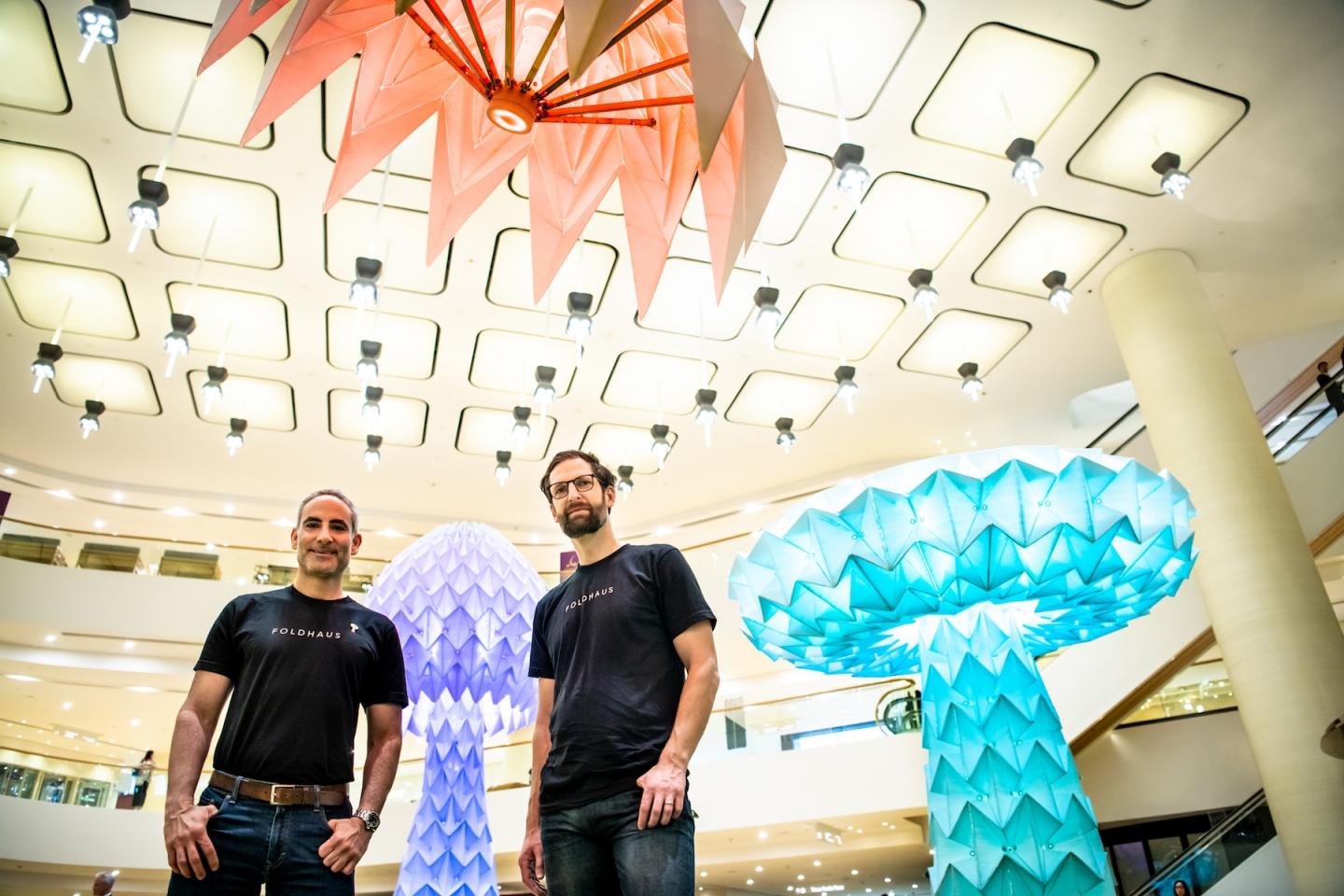 Joerg Student and Jesse Silver pictured against their immersive installation for Pacific Place