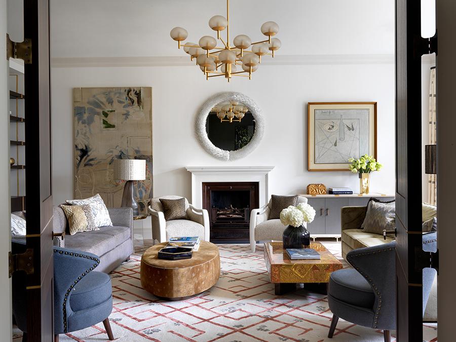 A warm, pared-back palette with gold accents, glamorous and vintage pieces, as well as a bespoke rug by Natalia feature in the sitting room. (Photo: Courtesy of Natalia Miyar Atelier)