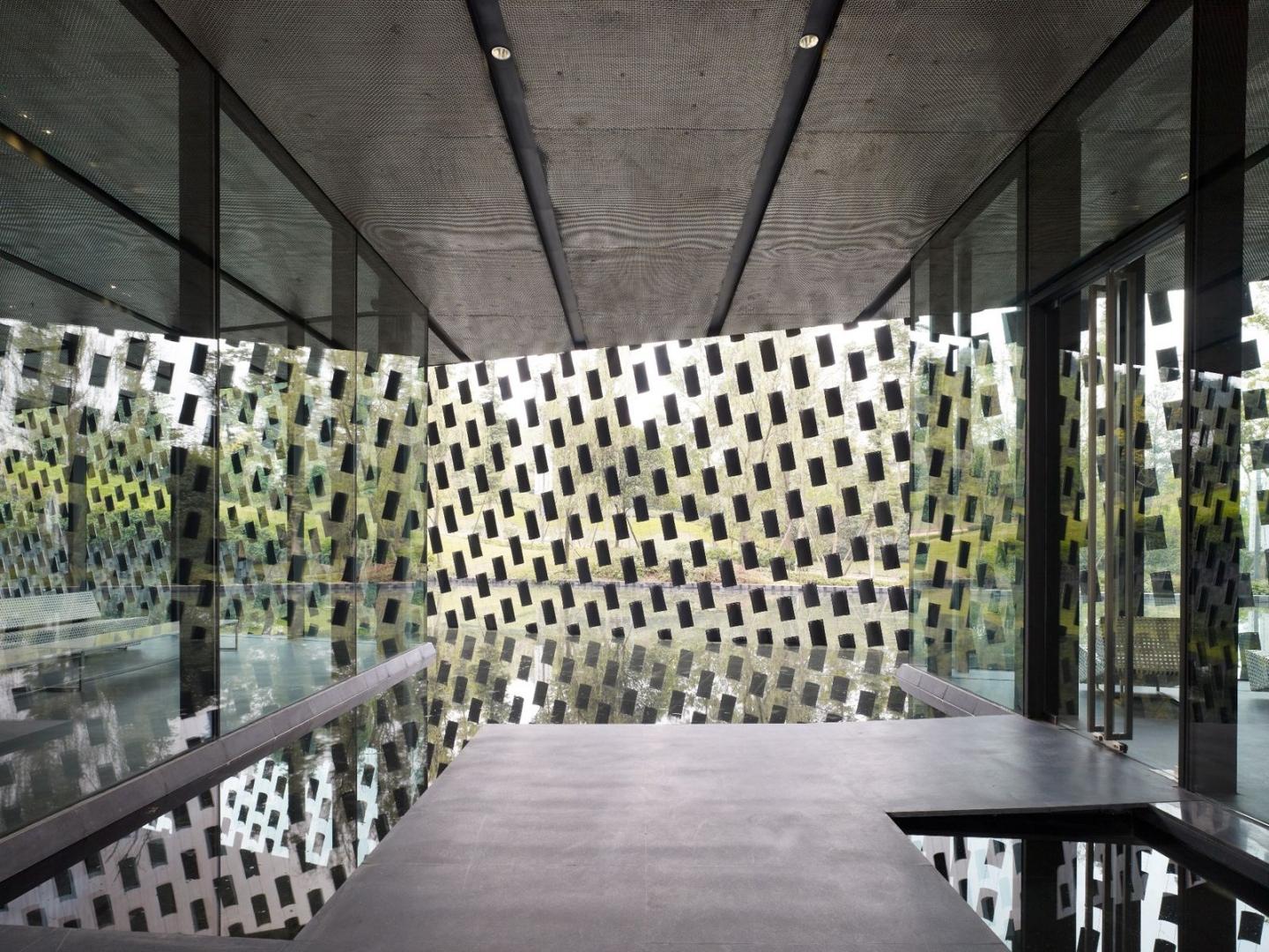 The tranquil interiors of the museum perched atop a pool of water