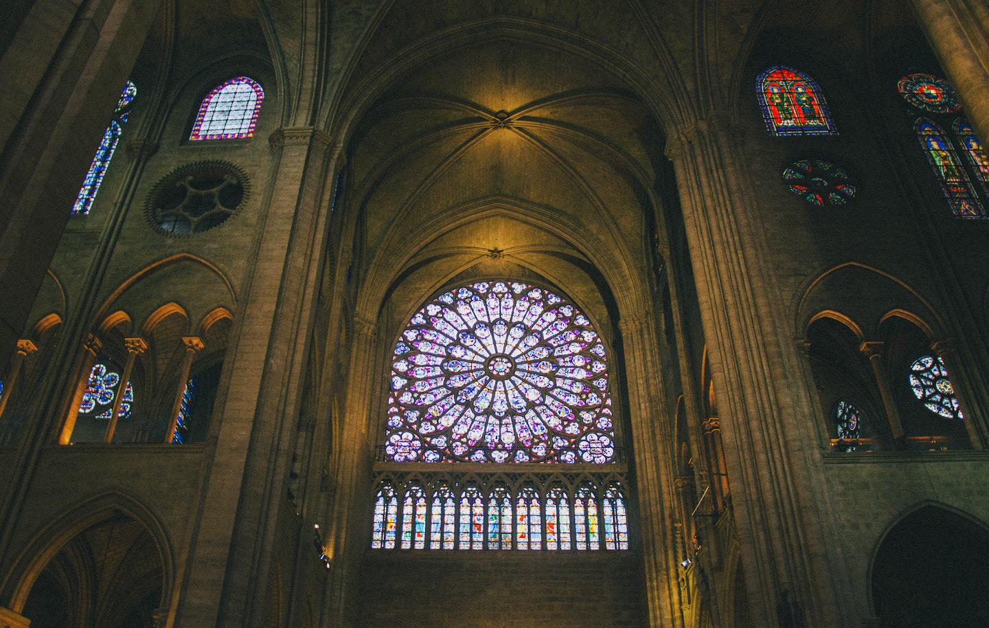 The cathedral's three rose windows were constructed in the 13th century (Photo via Pexels)