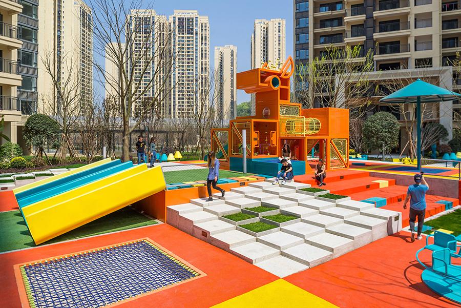 A voxelated horse-themed playground for children sits in the centremost area, also the highest in elevation. (Photo: Courtesy of 100architects)