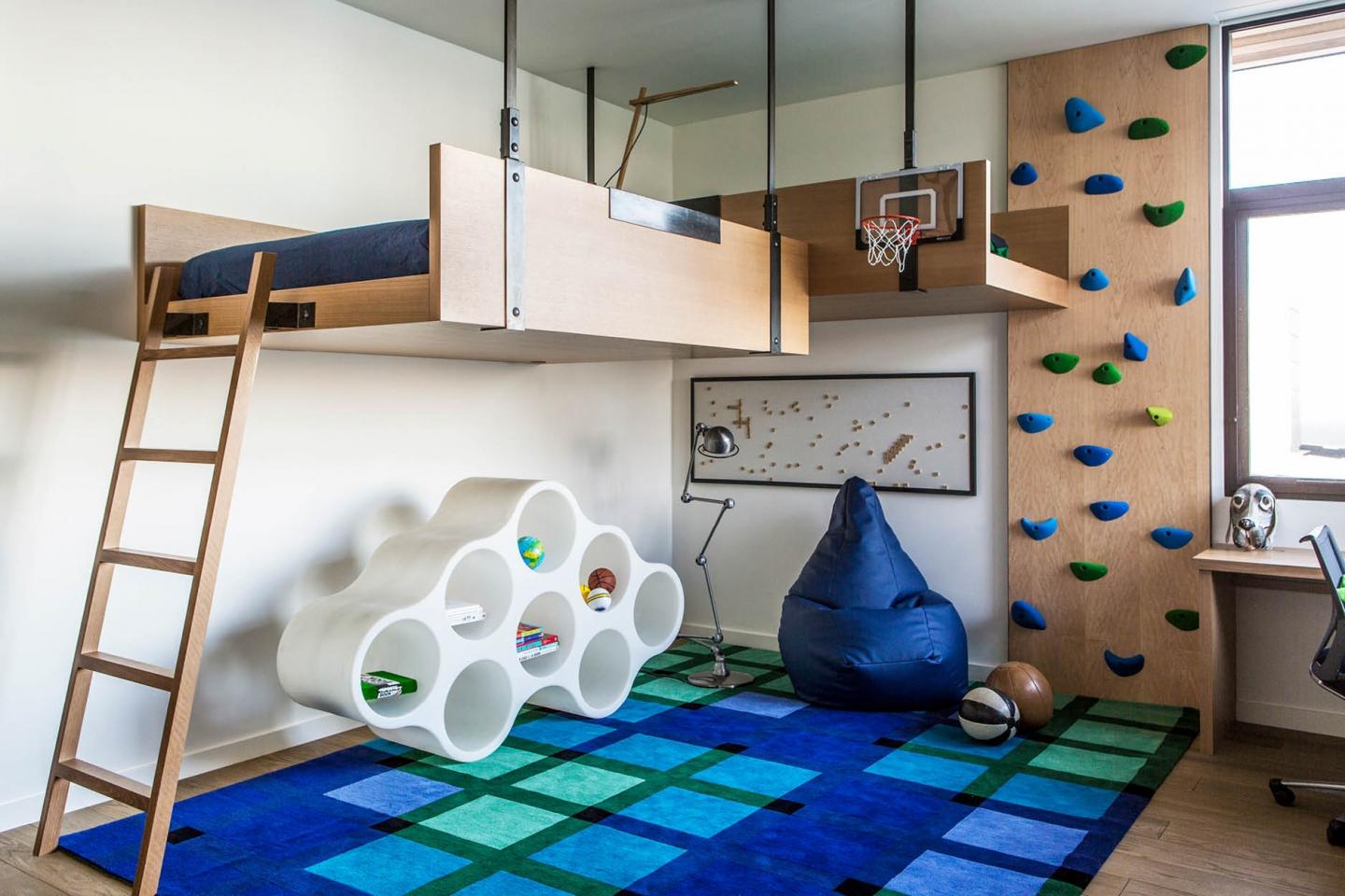 The home is equally enjoyable for the adults as well as the kids, with bedrooms of the latter creatively composed with climbing walls