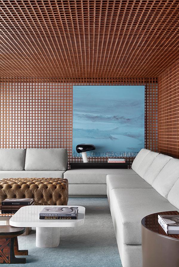The coffee tables, sofa, leather puff are from NOS Furniture. (Photo: Courtesy of Studio Guilherme Torres)