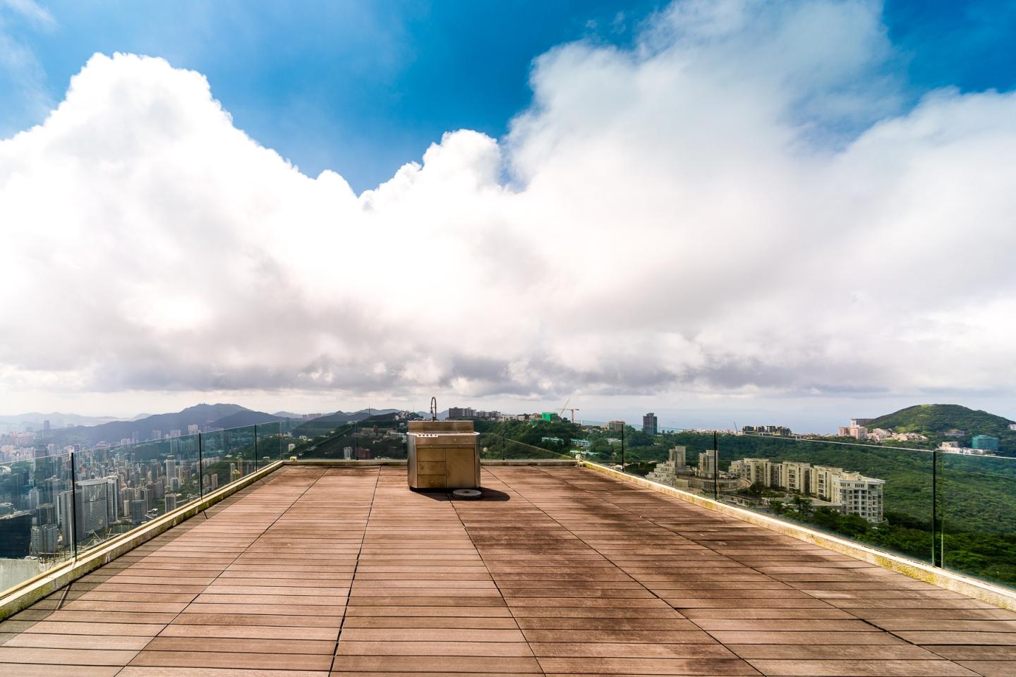 A two-tier rooftop offers sweeping views of the city below