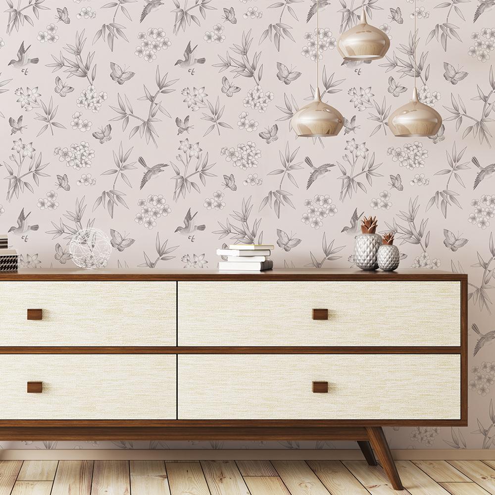 The hand-drawn wallpaper design is inspired by European Chinoiserie patterns with vibrant birds, butterflies, and blossoms