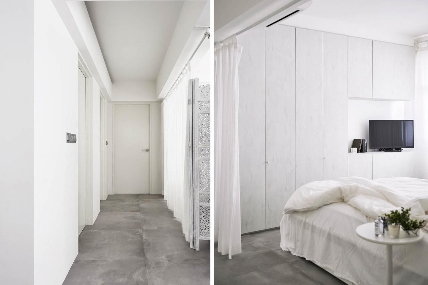 質感豐富的地板跟純白裝飾和傢具打造出鮮明悅目的對比