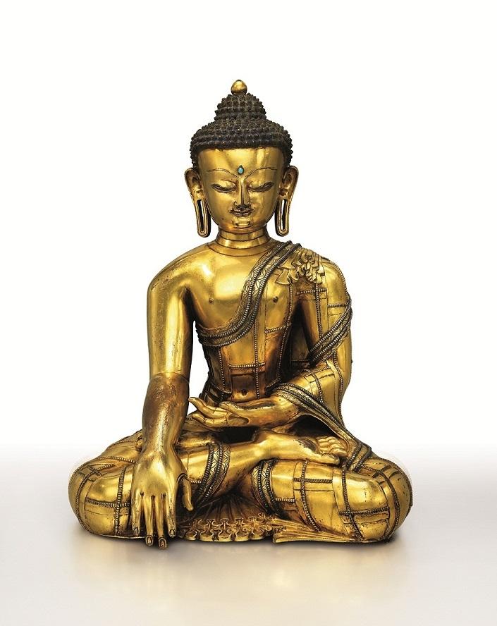 西藏十三/十四世紀  鎏金銅嵌銀釋迦牟尼佛坐像 高15¾ 吋 (40 公分) 估價待詢