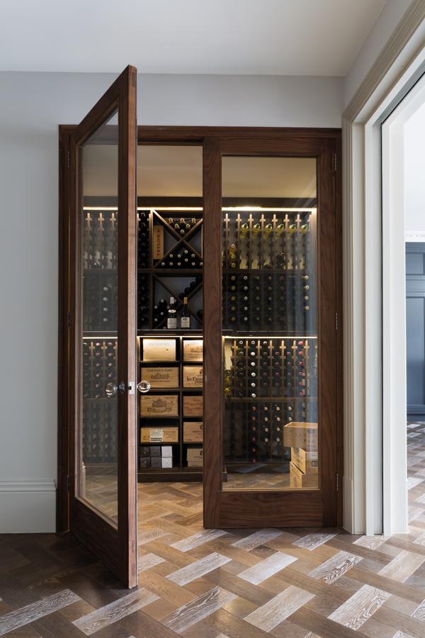Among the home's alluring features is an ample wine cabinet 
