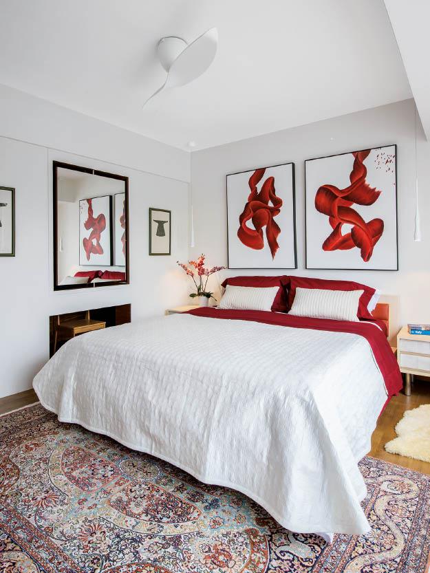 The artwork above the bed was purchased at the Affordable  Art Fair and chosen for its  fluid design that calls to mind the smoke of an incense stick