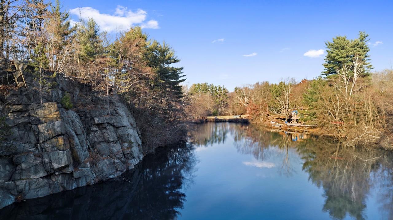 The secluded property also contains a quarry and boat house