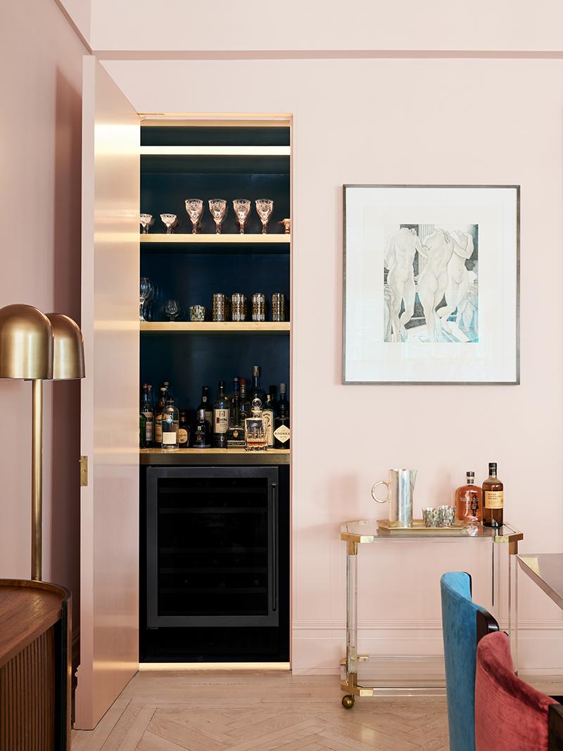 Off to the side of the dining room, a custom-built bar. (Photo: Brooke Holm)