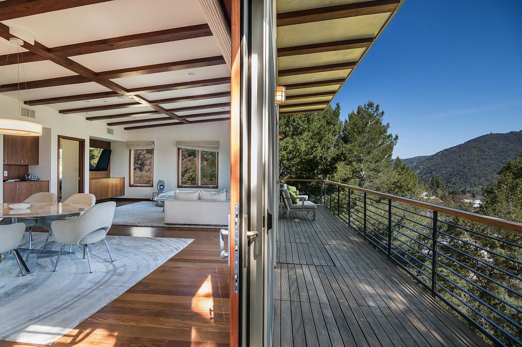 A spacious deck looks out to majestic vistas of the canyon