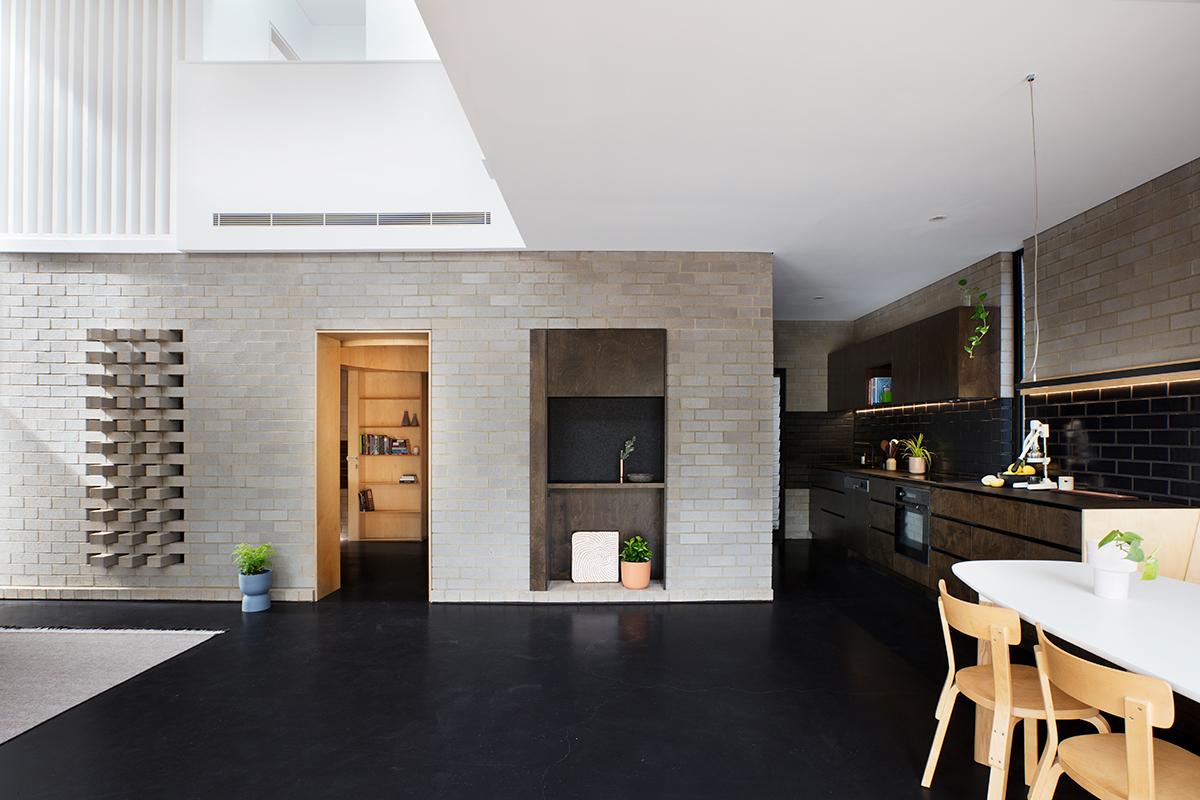 The house is a combination of light and dark spaces, as well as convivial and solitary ones. (Photo: Bo Wong)