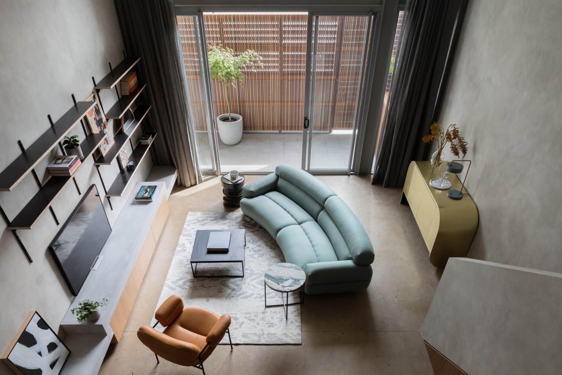 型格時尚的室內設計：以仿混凝土和渾圓線條組出溫暖家居