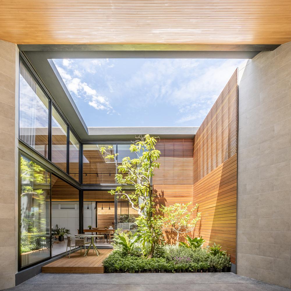 This Family Oasis in Bangkok is Bathed in Light and Timber