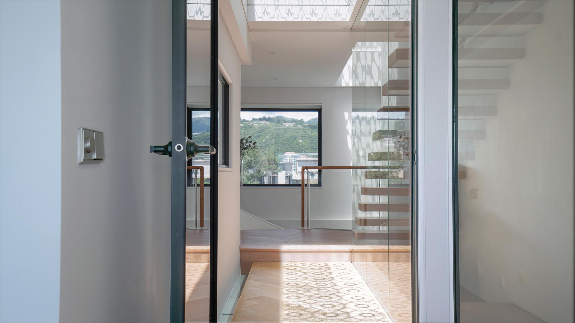 This Hong Kong Home Reimagines the Use of Picture Windows into a Pilgrimage of Light