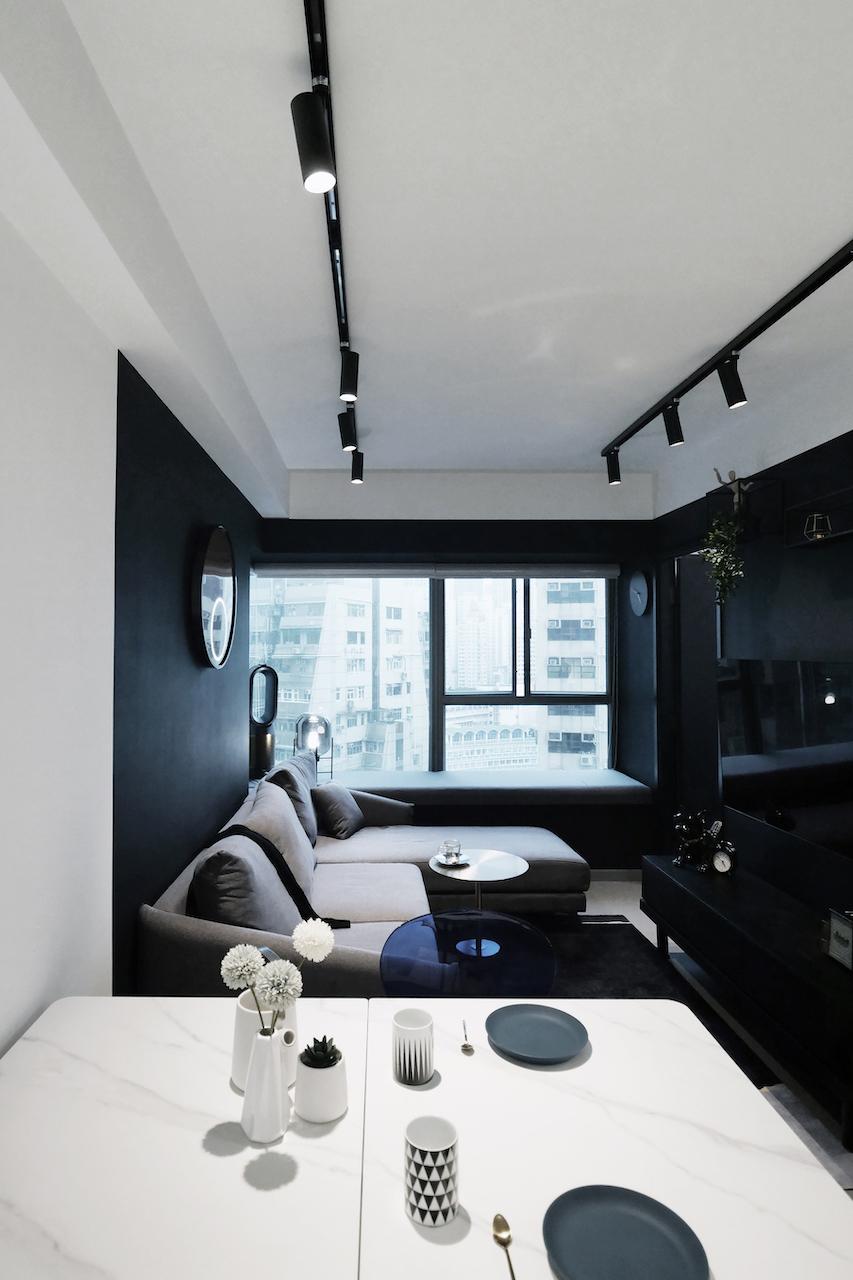 A Sleek Sheung Wan Apartment Furnished in Contrasting Black and White Tones