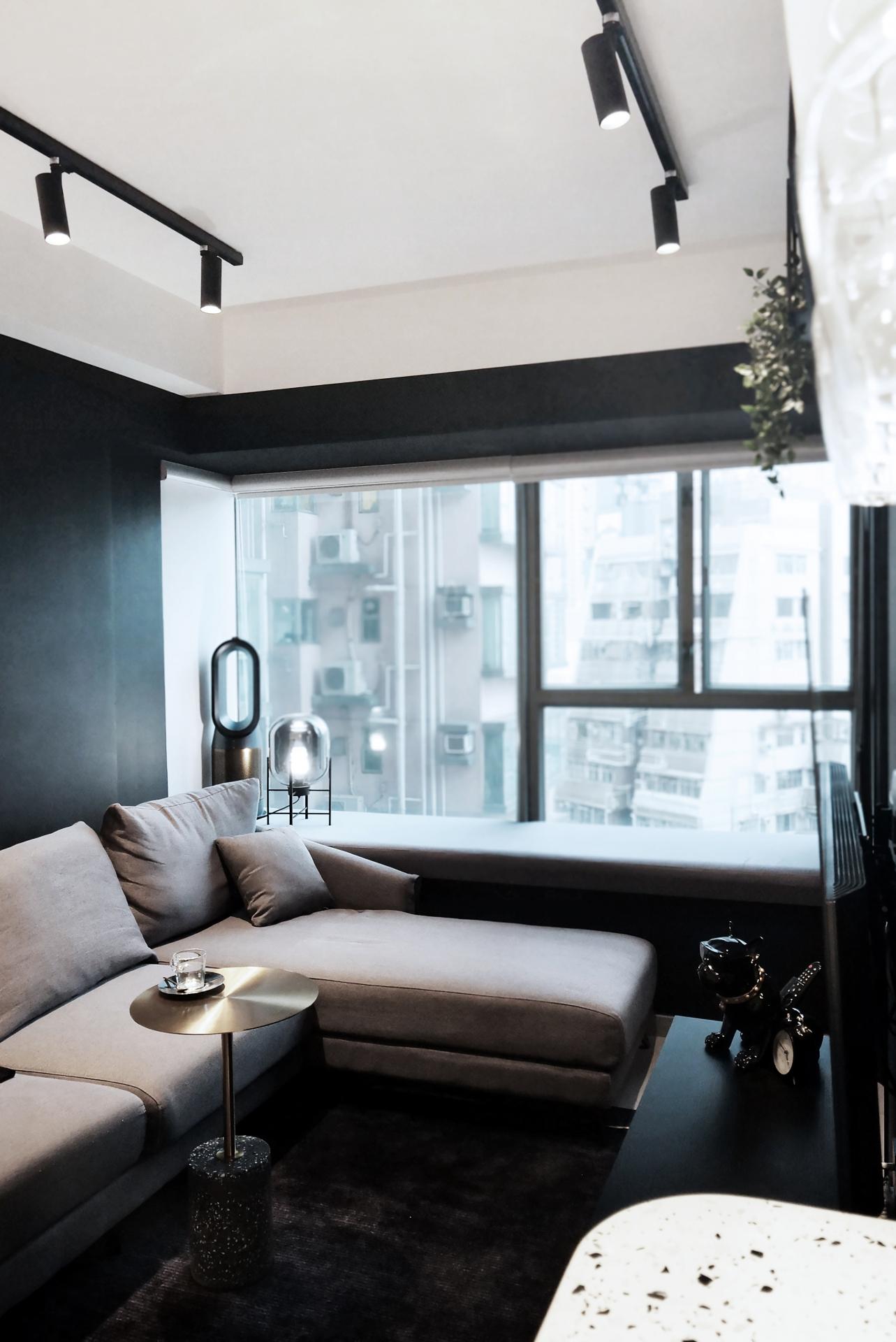A Sleek Sheung Wan Apartment Furnished in Contrasting Black and White Tones