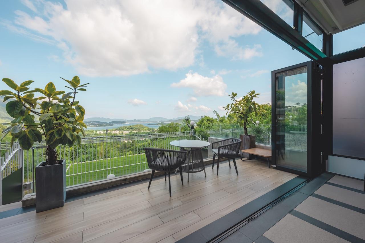 Tranquil landscape provides the perfect backdrop for a 6,000 sq. ft. abode in Tai Po