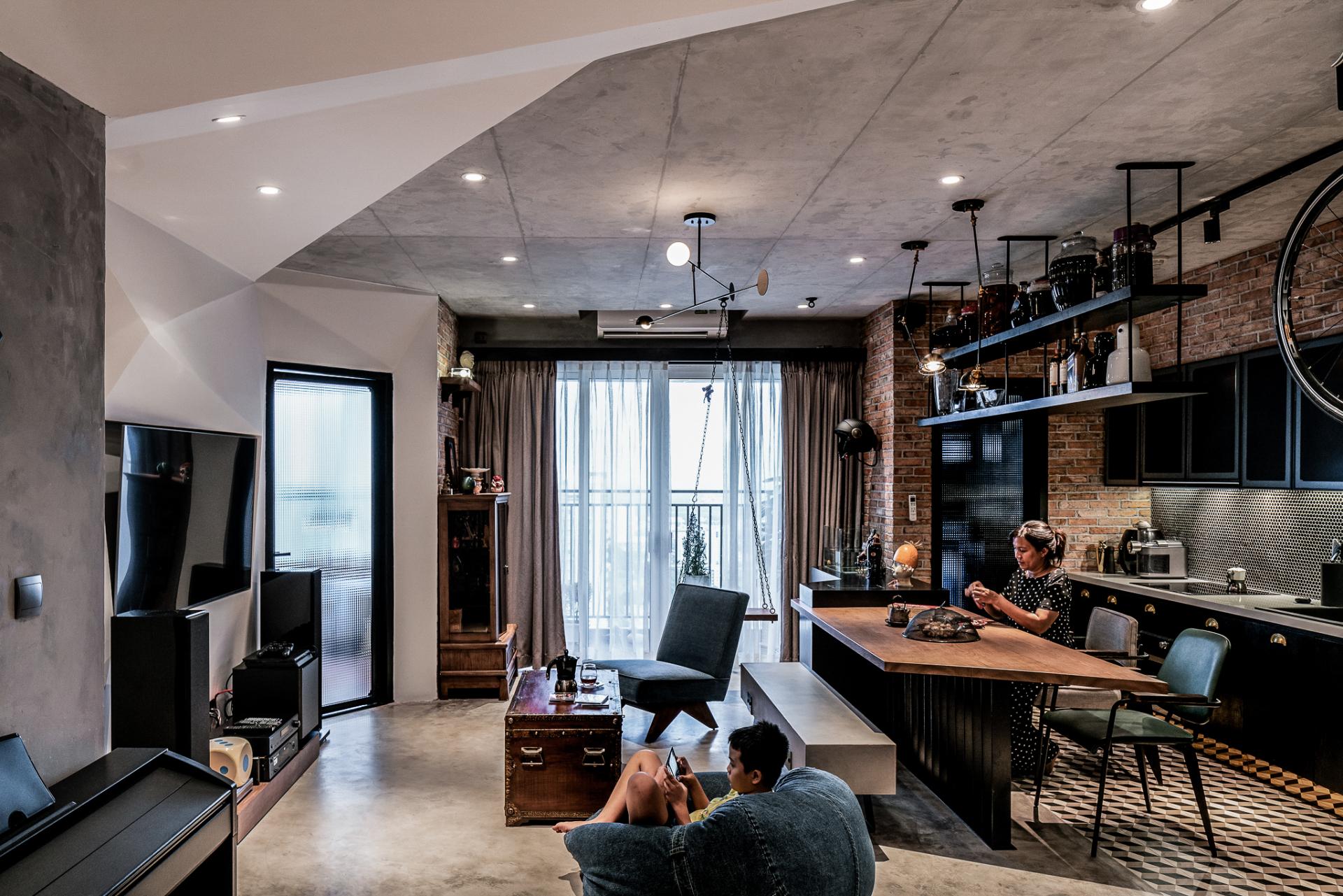 This 1,076 sq. ft. apartment has an industrial accent and a rustic "gangster" style