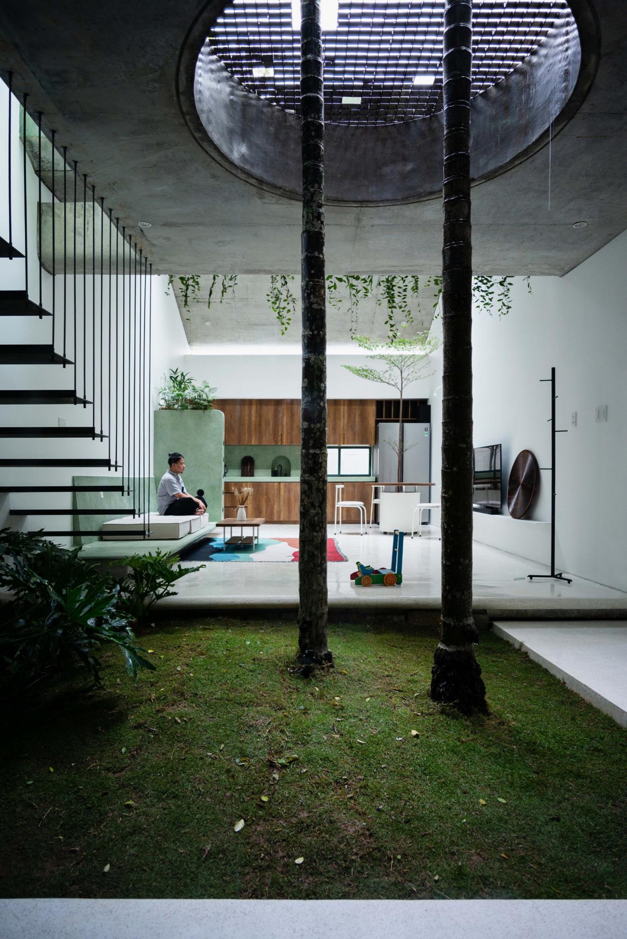 This home in Vietnam incorporates the essence of a botanical garden into its design