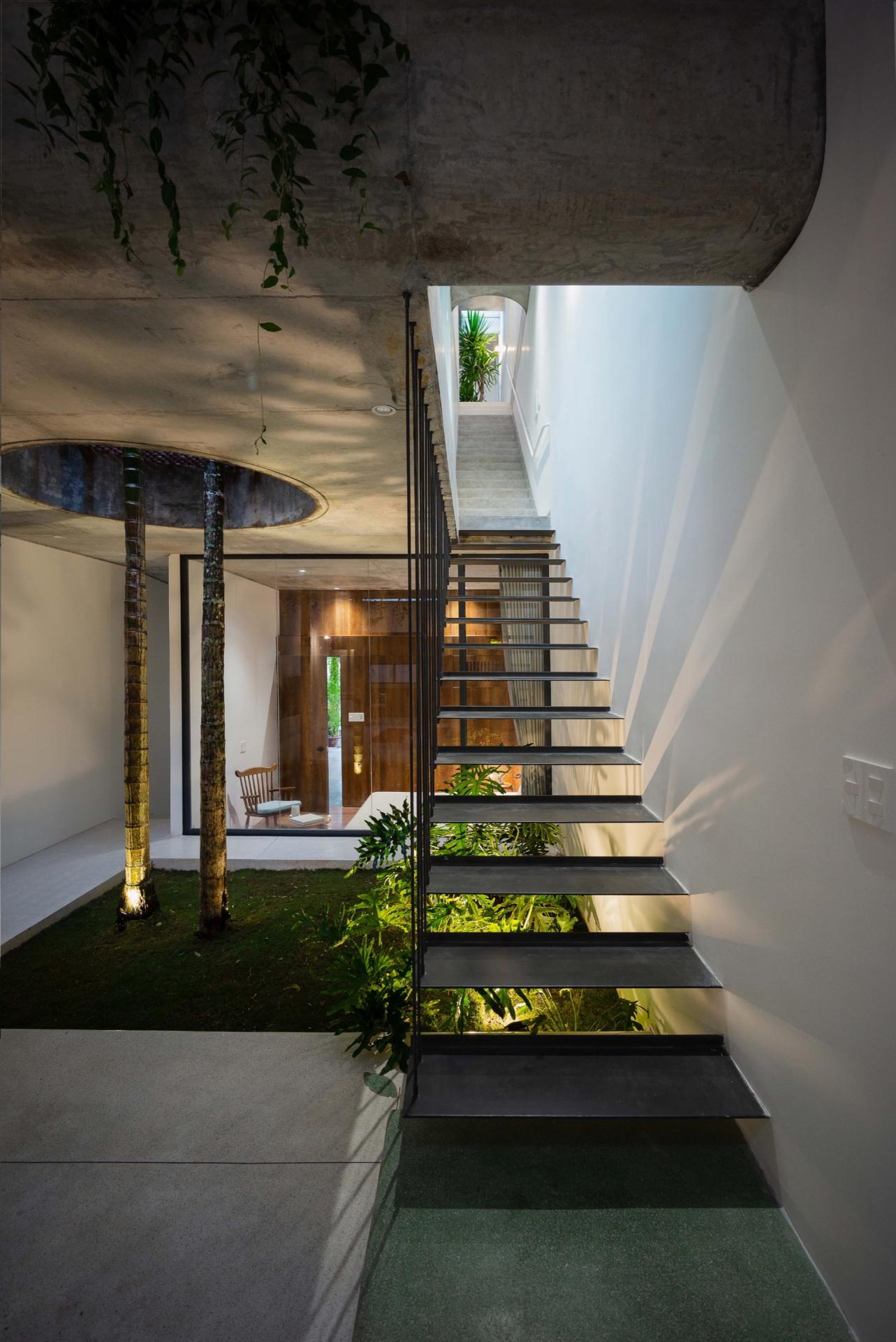 This home in Vietnam incorporates the essence of a botanical garden into its design