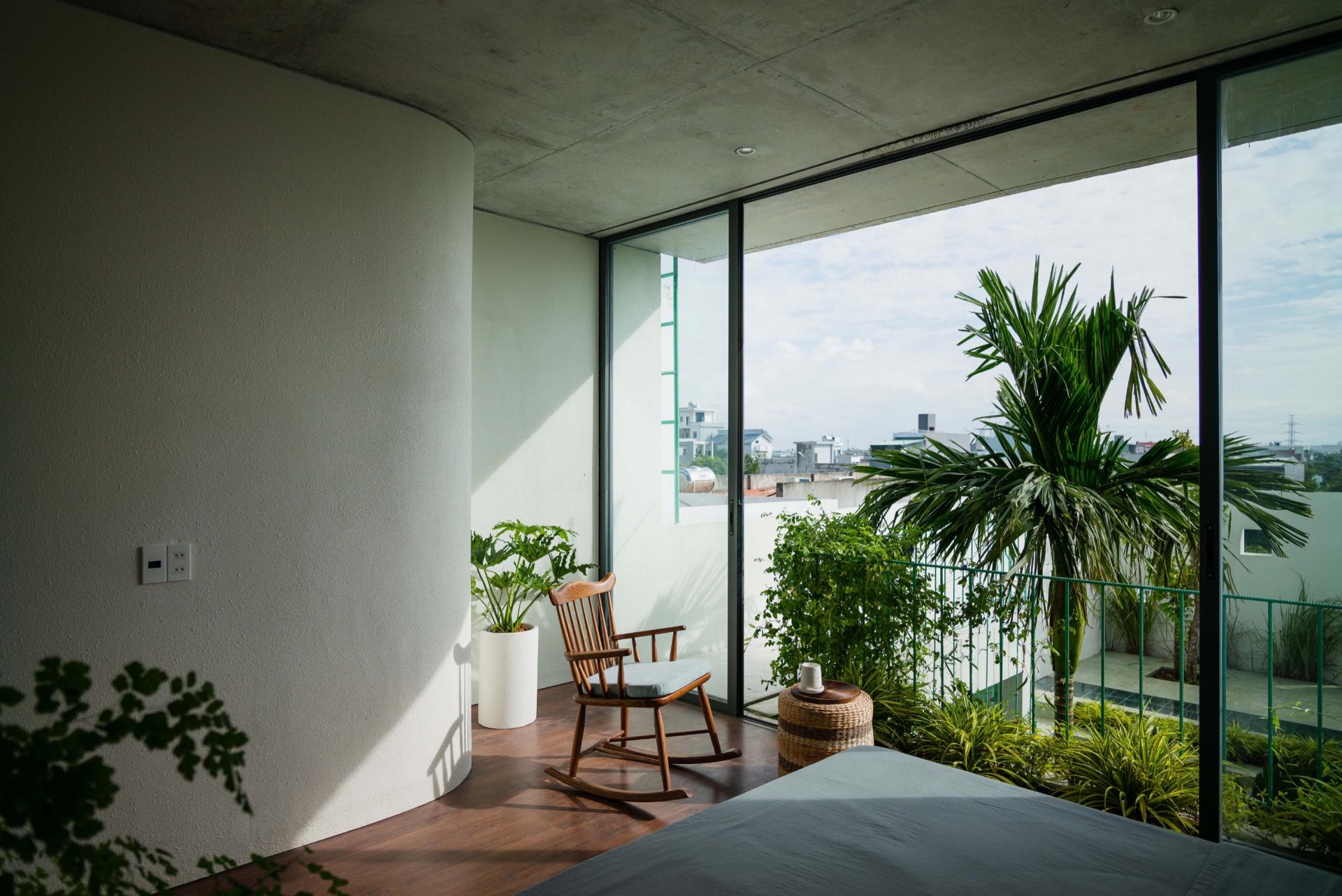 This home in Vietnam incorporates the essence of a botanical garden into its design